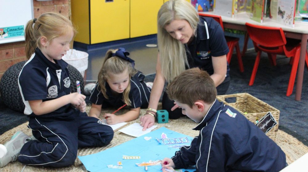 kindy students playing games