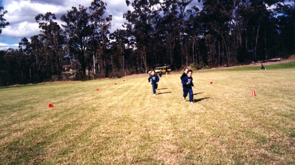 Kids running on field